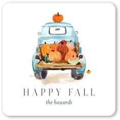 a blue truck with pumpkins in it and the words happy fall, the howards