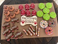 decorated cookies and dog treats on a table