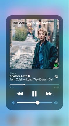 an iphone screen showing the music player for tom deli's long way down