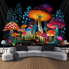 a couch sitting in front of a wall mural with mushrooms on the ground and lights coming from it