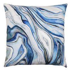 a blue and white pillow with an abstract design on the front, it is made out of