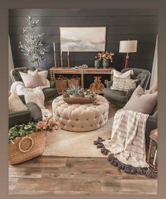 a living room filled with lots of furniture and decor on top of a hard wood floor