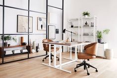 an office with a desk, chair and bookshelf