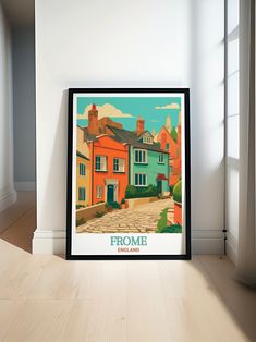 there is a framed poster on the floor in front of a window that reads frome, england