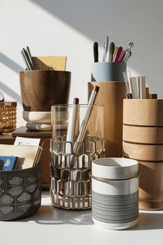 various office supplies sitting on top of a desk