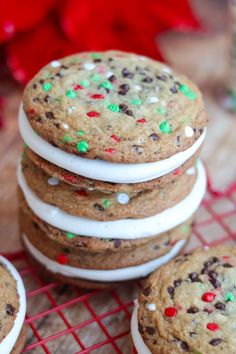 chocolate chip cookies with white frosting and sprinkles