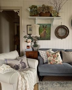 a living room filled with lots of furniture and decor on top of it's walls