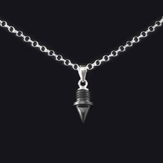 The 1/4" Pyramid Track/Cross-Country Spike Pendant can be purchased with or without a chain. Purchase Pendant only or choose, 16, 18, 20, 22, or 24-inch 2.2 mm Diameter Sterling Silver Rolo Chain with Lobster Claw Clasp. Mix and match different color spike pendants to create your own look! FREE SHIPPING! Pendants are made to order. Shipped within 5 business days via USPS First Class Mail. Black Sterling Silver Box Chain Necklace, Black Necklace With Box Chain And Round Pendant, Sterling Silver Black Box Chain Necklace, Black Sterling Silver Chain Necklace With Adjustable Chain, Black Sterling Silver Pendant Necklace, Black Sterling Silver Chain Necklace, Black Necklace With Silver Chain And Round Pendant, Black Jewelry With Silver Chain And Round Pendant, Black Pendant Chain Necklace With Lobster Clasp