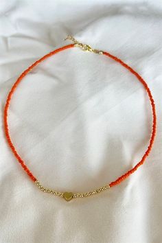 Great simple piece for every occasion. Cheap Orange Hand-strung Beaded Necklace, Cheap Orange Beaded Necklace For Summer, Cheap Trendy Orange Necklaces, Cheap Colorful Beaded Orange Necklaces, Cheap Orange Necklaces With Tiny Beads, Cheap Orange Necklaces With Letter Beads, Cheap Orange Letter Beads Necklace, Affordable Orange Letter Beads Necklace, Beaded Necklaces