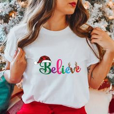 Believe Christmas Shirt, Christmas Family Shirt, Believe Shirt, Christmas Sweatshirt, Noel Gift. We use only high quality vinyl material for print. Please be advised before your order. Thanks! 1️⃣ Select T-Shirt size from Drop Down menu. 2️⃣ Select your T-Shirt color from Drop Down menu. 3️⃣ Choose your quantity as much as you want. 4️⃣ Click ADD TO CART. And, you can go back to add more shirts for your family members or friends or you can complete the checkout process. 5️⃣ Please Click "Proceed White Christmas Letter Print Tops, White Short Sleeve Christmas Shirt, White Christmas Shirt With Letter Print, White Christmas Letter Print Shirt, White Letter Print Shirt For Holiday, Festive White T-shirt With Letter Print, White Christmas Festive T-shirt, White Crew Neck T-shirt For New Year, Christmas Family Shirt