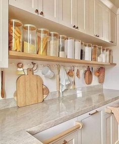 the kitchen counter is clean and ready to be used as a cook's pantry