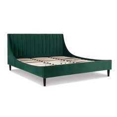 the bed frame is made up in green velvet and has buttons on each footboard