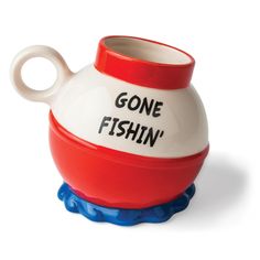 a red and white ceramic teapot with the words gone fishin on it's side