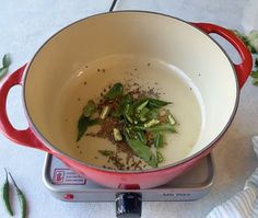 a pot filled with food sitting on top of a scale