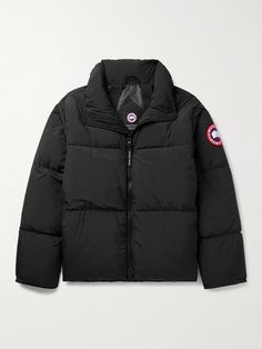 Canada Goose has designed protective and functional outerwear since 1957. Intended for everyday use, this 'Lawrence' jacket is padded with 750-fill power down and cut from Enduraluxe®, a water-repellent and durable fabric. It has two internal mesh pockets for your gloves and hat and a reflective webbing strap, so you can be seen at night. Winter In The City, Beulah London, Dashing Through The Snow, Luxury Sneakers, Lake Home, Webbing Strap, Silver Lake, Clothing Men, Outdoor Jacket