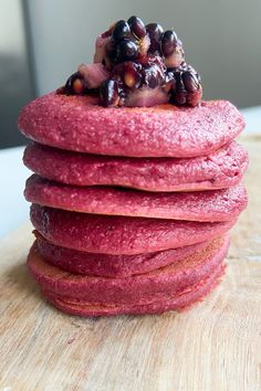 a stack of food that is on top of a wooden table