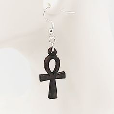 The Ankh symbol sometimes referred to as the Key of Life or the Key of the Nile is representative of eternal life in Ancient Egypt. Created by Africans long ago, the ankh is said to be the first or original cross. Metal: Sterling Silver, 925 Made out of birch plywood. Measures 2.5x5/8" appx. Made by Front Range Creations Made in Colorado Psychic Dreams, Life In Ancient Egypt, Ankh Symbol, Eternal Life, Birch Plywood, Ancient Egypt, Sterling Earrings, Sterling Silver Earrings, Sterling Silver