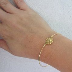 Rose Bracelet - Rose Jewelry - A gold tone pure brass rose flower charm has been transformed into a dainty & delicate rose flower bangle bracelet with a gold tone brass band. Perfect for those who like Victorian jewelry themes! I can also make this rose bangle bracelet with a 14k gold filled band for an additional $10. If you would like this option for your rose jewelry, select from options when ordering. This gold rose bracelet stacks great with other bangles from my collection as you can s Elegant Rose Gold Bracelets With Rose Design, Elegant Rose Gold Bracelet With Rose Design, Gold Flower Bracelets With Rose Design, Gold Floral Bracelets With Rose Design, Gold Flower Bracelet With Rose Design, Rose Gold Bracelets With Rose Design For Wedding, Gold Bracelet With Rose Design For Gift, Rose Gold Rose Design Bracelets For Wedding, Delicate Gold Jewelry With Roses