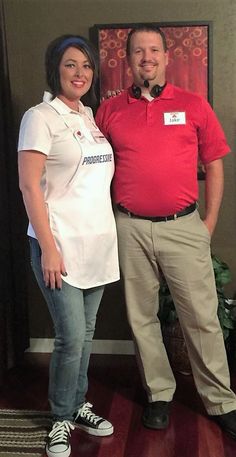 a man and woman standing next to each other