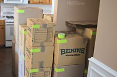 boxes stacked on top of each other in a kitchen