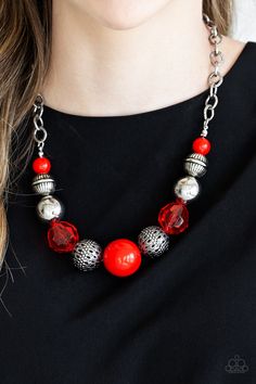 A collection of antiqued silver beads, glassy red crystal-like beads, and oversized red beads are threaded along an invisible wire below the collar. Textured in linear patterns, an antiqued silver chain attaches to the colorful compilation for a statement-making finish. Features an adjustable clasp closure. Sold as one individual necklace. Includes one pair of matching earrings. P2ST-RDXX-033XX Red Beaded Necklaces, Sugar Sugar, Red Beads, Chunky Jewelry, Red Necklace, Beaded Statement Necklace, Paparazzi Accessories, Paparazzi Jewelry, Affordable Jewelry