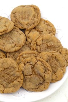 a white plate topped with cookies on top of a table