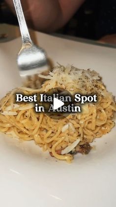 someone is eating spaghetti on a plate with a fork in their hand and the caption reads best italian spot in a latin restaurant