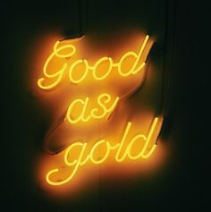 a neon sign that says good as gold