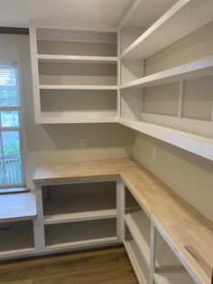 the empty room is clean and ready to be used as a storage area for various items