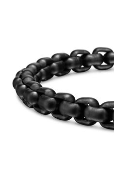 A matte black finish overtakes the chunky box links of this sterling silver chain bracelet secured by a polished stainless steel push-clasp closure. Push-clasp closure Stainless steel/sterling silver/PVD Made in Germany Modern Black Oval Link Jewelry, Modern Gunmetal Chain Bracelet With Solid Link Construction, Black Chain Link Jewelry With Solid Construction, Black Jewelry With Rectangular Box Chain Links, Black Chain Link Bracelet For Formal Occasions, Black Link Chain Bracelet Modern Style, Modern Black Chain Bracelet For Formal Occasions, Modern Black Link Chain Bracelet, Formal Black Chain Link Bracelets