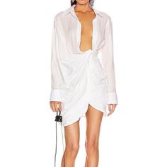 The Celeb Favorite Jacquemus La Robe Bahia Dress In Off-White. Nwt. Excellent Condition. French Size 38 Runs A Bit Small In My Opinion So Best Fit For A 2-4 Maybe, But Check Measurements! Has A Little Stretch But Not Much. As Seen On Nikki Reed, Kendall Jenner, Sophie Turner, Kim Kardashian, Emily Ratajkowski And Many More! 69% Cotton 25% Linen 6% Viscose Length: 39” Pit To Pit: 17.5” Waist: 13” Sleeve: 26.25” White Fitted Shirt Dress For Brunch, Chic White Shirt Dress For Party, Elegant Mini Shirt Dress For Beach, Chic White Shirt Dress, White Mini Shirt Dress For Beach, Chic White Shirt Dress For Brunch, Elegant Cocktail Shirt Dress For Summer, Elegant Summer Cocktail Shirt Dress, Chic White Shirt Dress For Formal Occasions