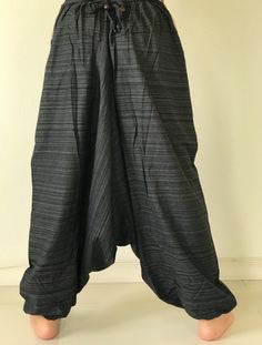 "These super soft rayon baggy unisex harem pants have the \"flow\", perfect of yoga or just a cool strolling. Comfort and character are what these pants are all about. They have the traditional sarong look & feel but a lot more practical when it comes to activity like yoga. As a bonus, they are convertible! Just pull them up and you get yourself a cute jumpsuit in a flash. Together with elastic cuff legs, you can wear them short or long. The pants have smock waist (wide bang elastic) with no Baggy Full-length Cotton Harem Pants, Baggy Full-length Harem Pants For Yoga, Baggy Full Length Harem Pants For Yoga, Cotton Drop Crotch Harem Pants For Yoga, Baggy Drop Crotch Harem Pants For Yoga, Relaxed Fit Drop Crotch Harem Pants, Relaxed Fit Drop Crotch Harem Pants Lagenlook, Lagenlook Harem Pants With Drop Crotch And Relaxed Fit, Lagenlook Drop Crotch Harem Pants