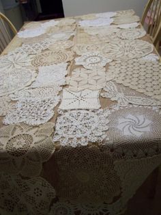 the table is covered with lacy doily