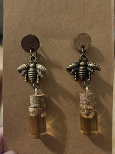 In honor of our "Honey Man" Grandfather, who recently passed on, these bee-themed earrings celebrate his memory. Bottles contain his real, raw honey. Handmade Honey Color Jewelry Gift, Handmade Honey-colored Jewelry For Gifts, Handmade Honey Jewelry For Gift, Honey Bee Earrings, Hood River, Earrings Antique, Bee Earrings, Bee Theme, Raw Honey