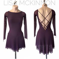 the back of a purple leotard dress with sheer cutouts and long sleeves