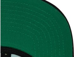 Material: 100% Polyester High Crown Structured fit Flat bill Snapback Six solid panels with eyelets Contrast-color undervisor One size fits most Embroidered graphics with raised details Dry clean only Officially licensed Green Visor Fitted Hat For Sports, Green Snapback Fitted Hat For Sports Events, Green Snapback Hat For Sports Events, Green Visor Snapback Hat For Sports, Green Fitted Hat With Curved Brim For Sports, Green Six-panel Snapback Hat For Sports Events, Green Six-panel Snapback Hat For Sports, Green Adjustable Fitted Hat For Baseball Season, Adjustable Green Fitted Hat For Baseball Season