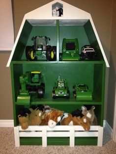 toy farm animals and tractors in a green shelf