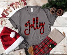 a t - shirt with the word julia on it next to christmas decorations and other items