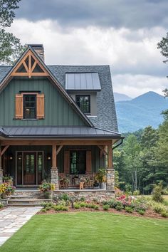 a large house with lots of windows on the front and side of it's roof