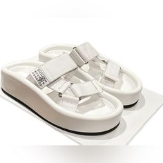 Size Us8 Luxury Platform Slip-on Sandals, White Platform Slides With Round Toe, White Leather Platform Slippers For Spring, White Platform Slip-on Slides, White Leather Slip-on Platform Slippers, Luxury Platform Sandals For Summer, Luxury Summer Platform Sandals, Luxury Platform Slides For Summer, Luxury Slip-on Platform Sandals