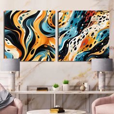 two paintings on the wall in a living room