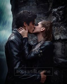 a man and woman kissing in the rain