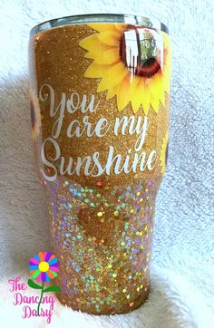 you are my sunshine glitter tumbler cup with sunflower on the side and words that read, you are my sunshine