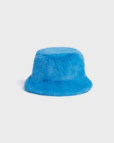 PLUCHE™ bucket hat. Trendy Blue Flat Brim Bucket Hat, Winter Blue Bucket Hat, Blue Bucket Hat With Flat Brim For Spring, Trendy Blue Winter Bucket Hat, Trendy Blue Bucket Hat For Winter, Blue Winter Bucket Hat With Curved Brim, Casual Blue Cloche Hat With Short Brim, Casual Blue Wide Brim Cloche Hat, Fur Bucket