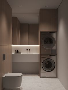 a washer and dryer in a modern bathroom