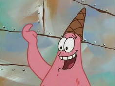 a pink cartoon character with an ice cream cone on his head and hands in the air