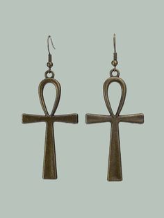 This is a pair of outstanding statement earrings with an Egyptian Ankh. The Ankh is one of the most used symbols in ancient Egyptian culture and it is like the Christian cross which represents life (Life after death). Product Specification: Style: Ancient Egyptian Shape\pattern: Cross Metals Type: Zinc alloy Material: Metal Jewelry: Art Deco Item Type: Earrings Fine or Fashion: Fashion Earrings: Ankh Earrings Earring Type: Drop Earrings Ankh Earrings, The Ankh, Egyptian Ankh, Bat Pattern, Banana Milk, Egyptian Culture, Deco Earrings, Anime Tees, Statement Art