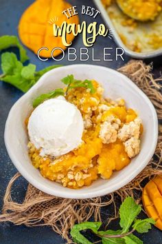 a white bowl filled with ice cream next to sliced peaches