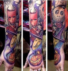 a hand with some tattoos on it and a person holding a jack - o'- lantern