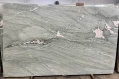 a large marble slab sitting on top of a wooden floor